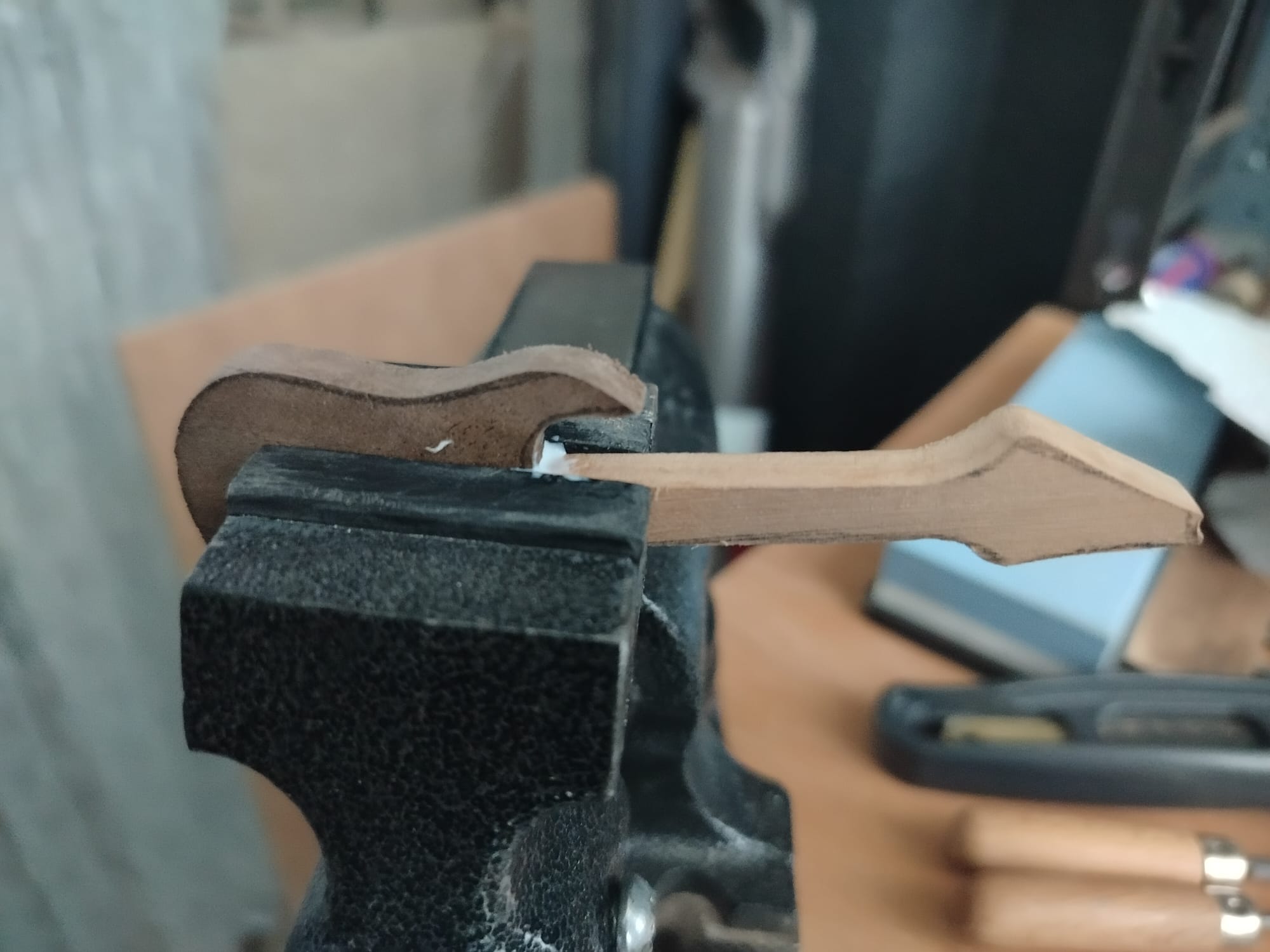 Vise holding the pieces while the glue cures